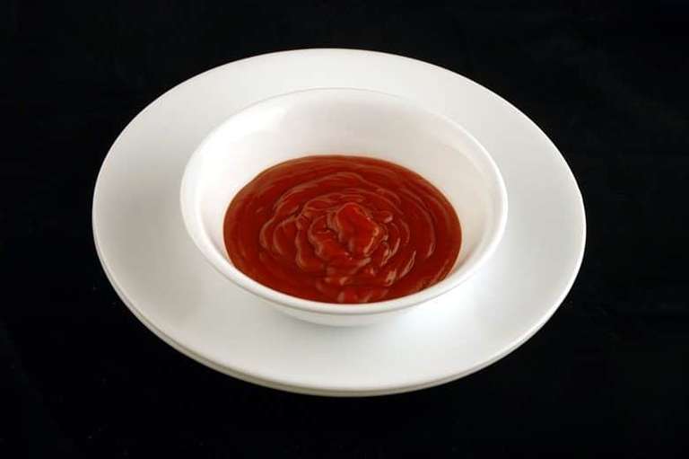 Porção de Ketchup em quantidade equivalente a 200 calorias. Série do Fotos do site Wise geek.