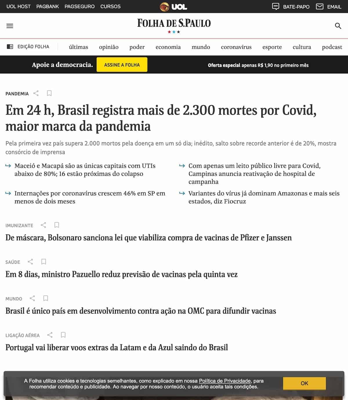 Parte superior da primeira página do site Folha de São Paulo com diversas notícias tristes. Em destaque: - Em 24 h, Brasil registra mais de 2.300 mortes por Covid, maior marca da pandemia - De máscara, Bolsonaro sanciona lei que viabiliza compra de vacinas de Pfizer e Janssen saúde - Em 8 dias, ministro Pazuello reduz previsão de vacinas pela quinta vez mundo - Brasil é único país em desenvolvimento contra ação na OMC para difundir vacinas